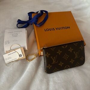 Louis Vuitton Brown Monogram Clutch with Gold Details